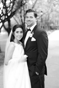 smiling bride and groom