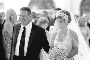 father walks bride down aisle at all saints greek orthodox church in pittsburgh, pa