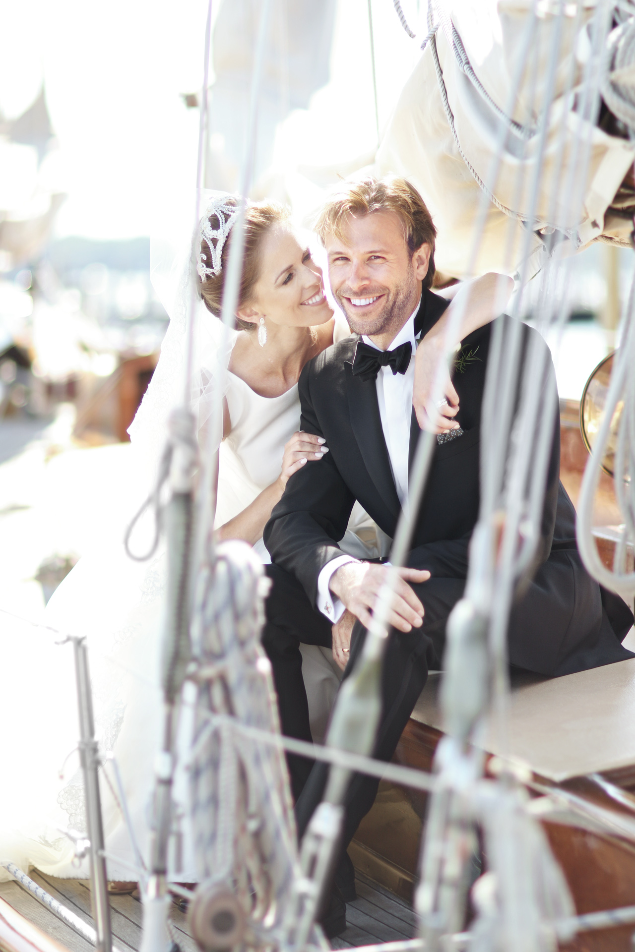 newlyweds on sailboat