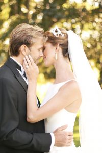 bride and groom kissing