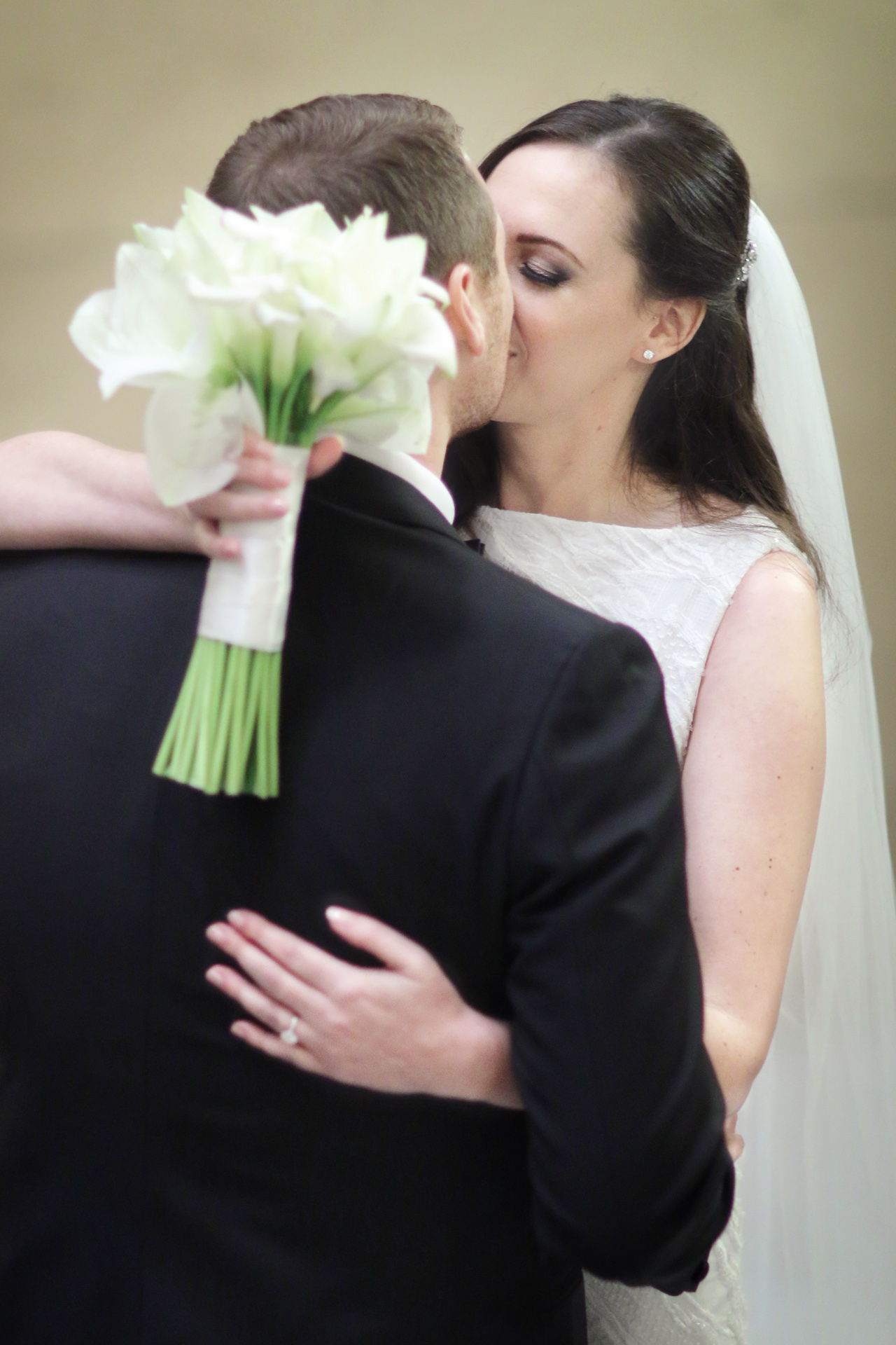 bride groom kissing