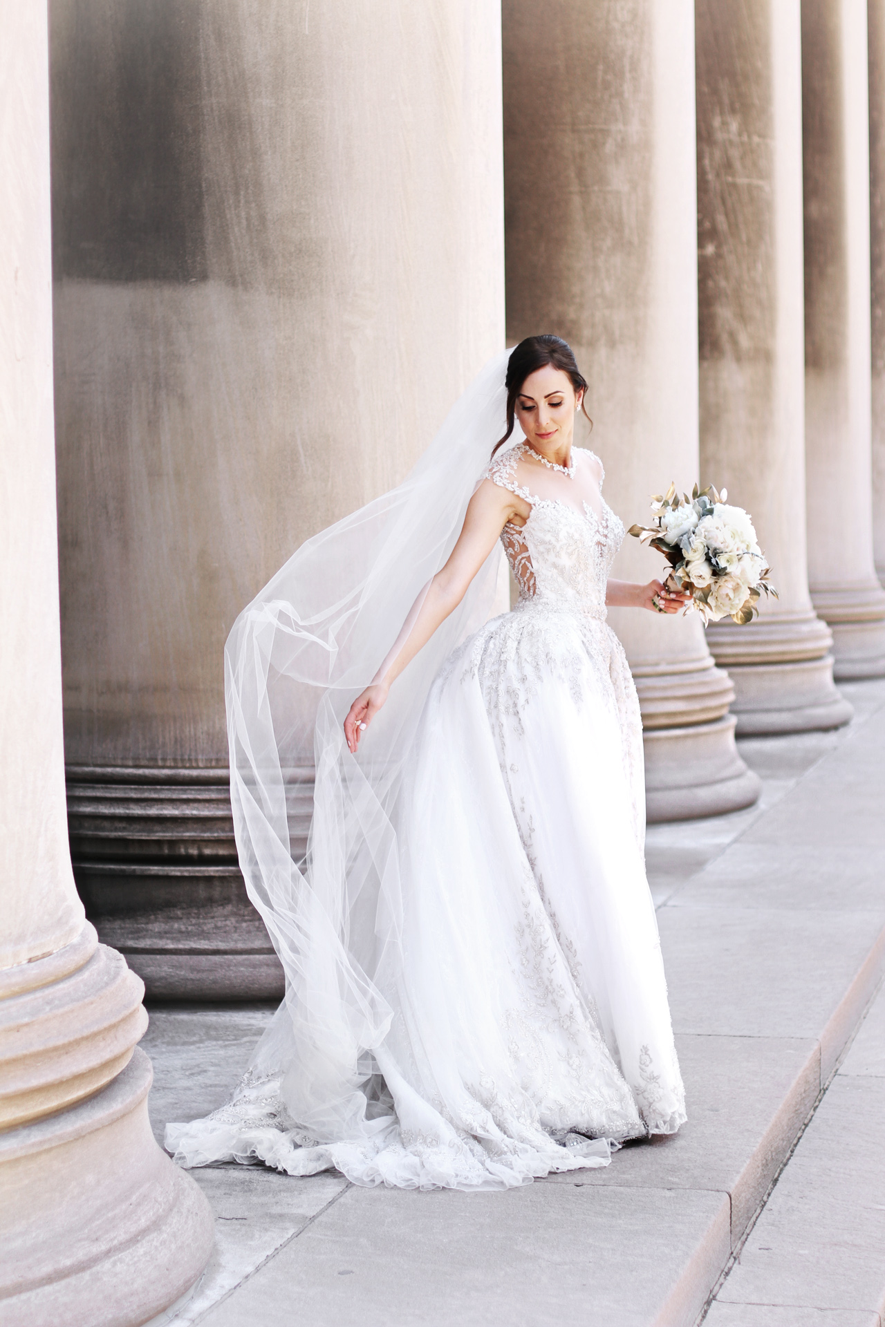 gorgeous bride at carnegie pillars in Pittsburgh, PA