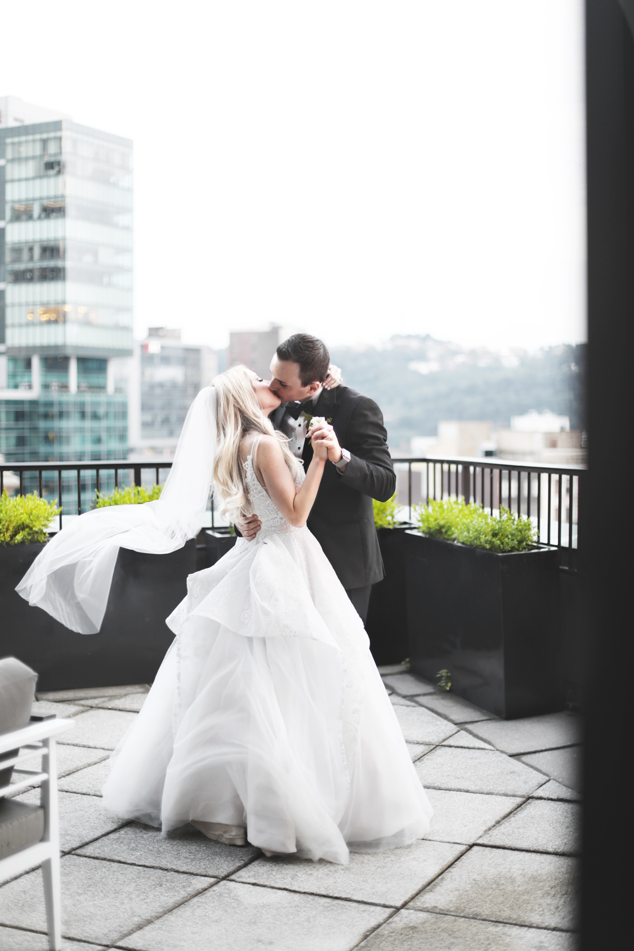 newlyweds on terrace at renaissance hotel pittsburgh