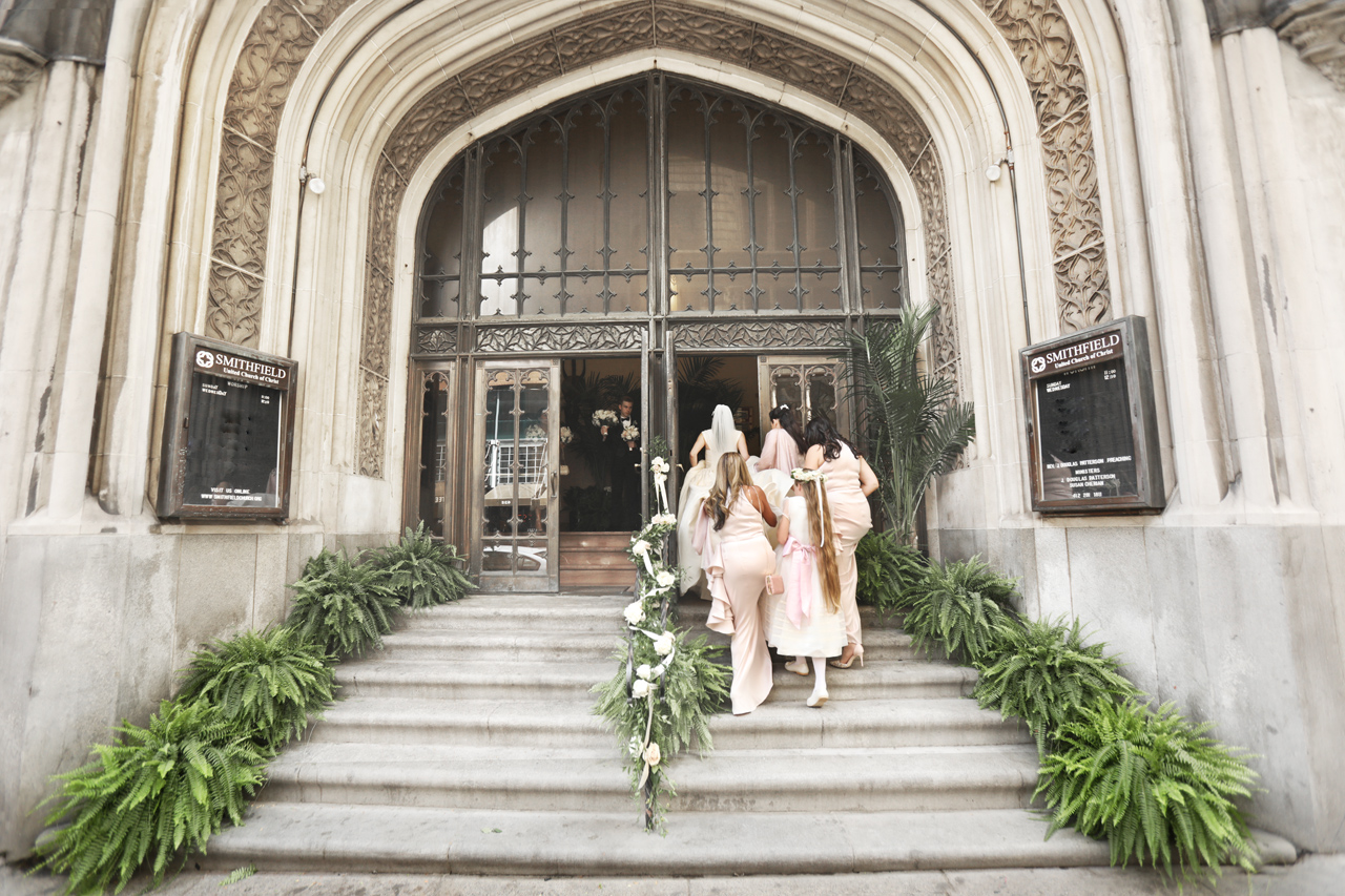 bridesmaids enter church for a wedding in downtown Pittsburgh, PA