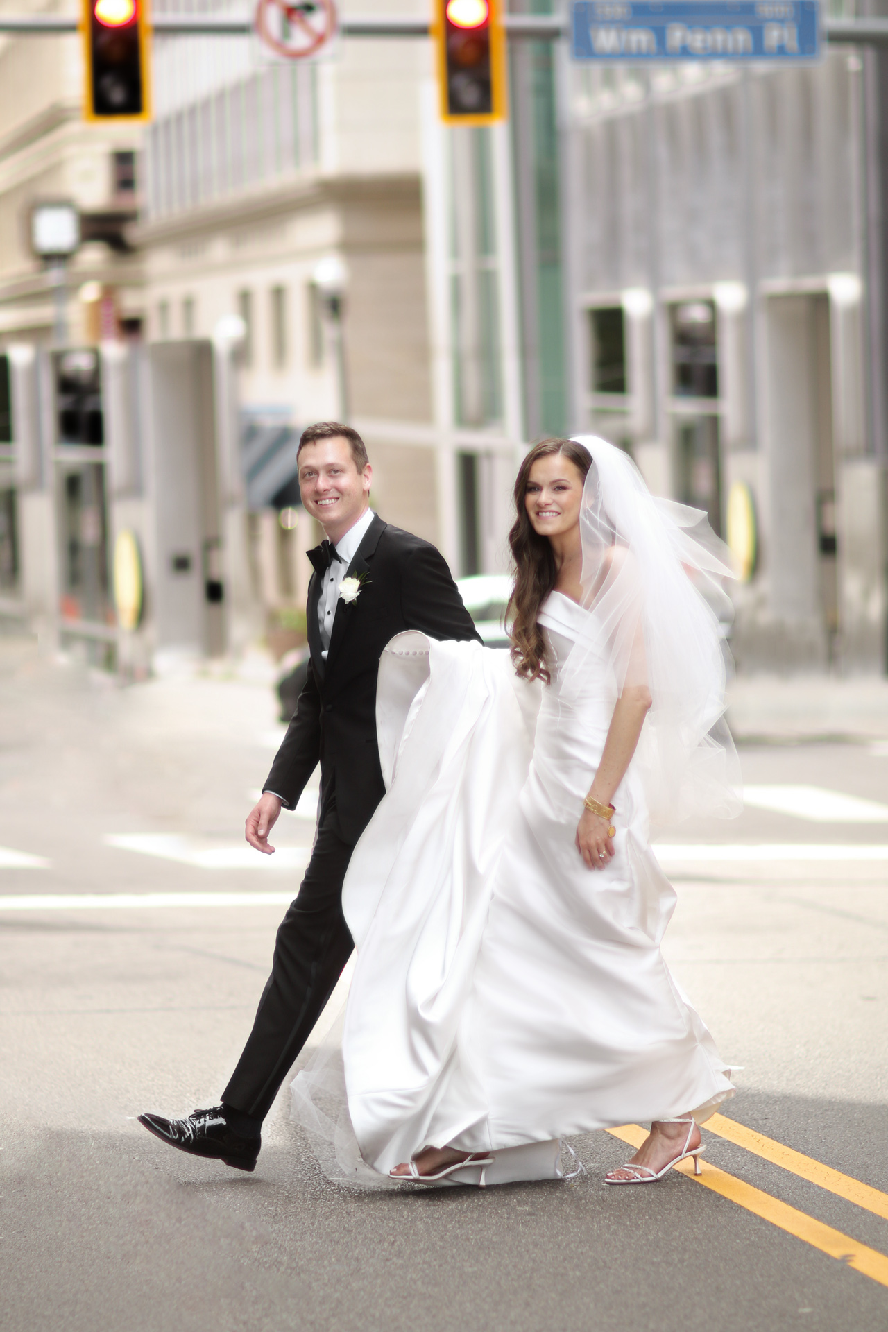 Bride and Groom crossing the street in downtown Pittsburgh, PA